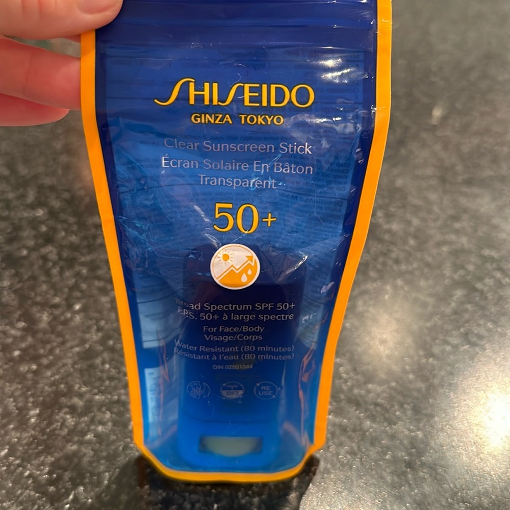 BNIB SHISEIDO 50+ clear sunscreen, stick water resistant for face and body